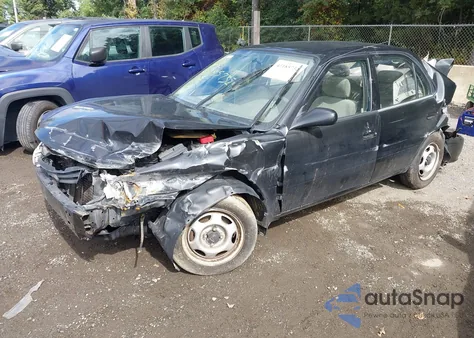 2001 Toyota Corolla Ce from USA, damaged, VIN 2T1BR12E21C388319